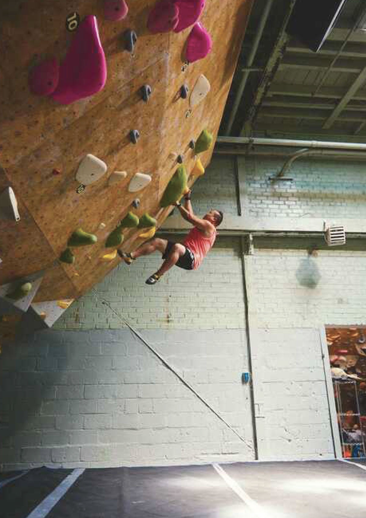 Climber climbing at Brooklyn Boulders